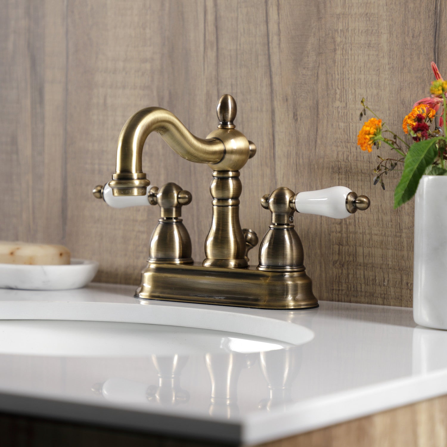 Kingston Heirloom KB1603PL - Heritage Double-Handle 3-Hole Deck Mount 4-Inch Centerset Bathroom Faucet with Pop-Up Drain, Antique Brass — thumbnail 3